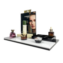Custom High Quality LED Light Makeup Exhibition Holder Cosmetics Display Rack with Grooves for Retail Store Perfume Display